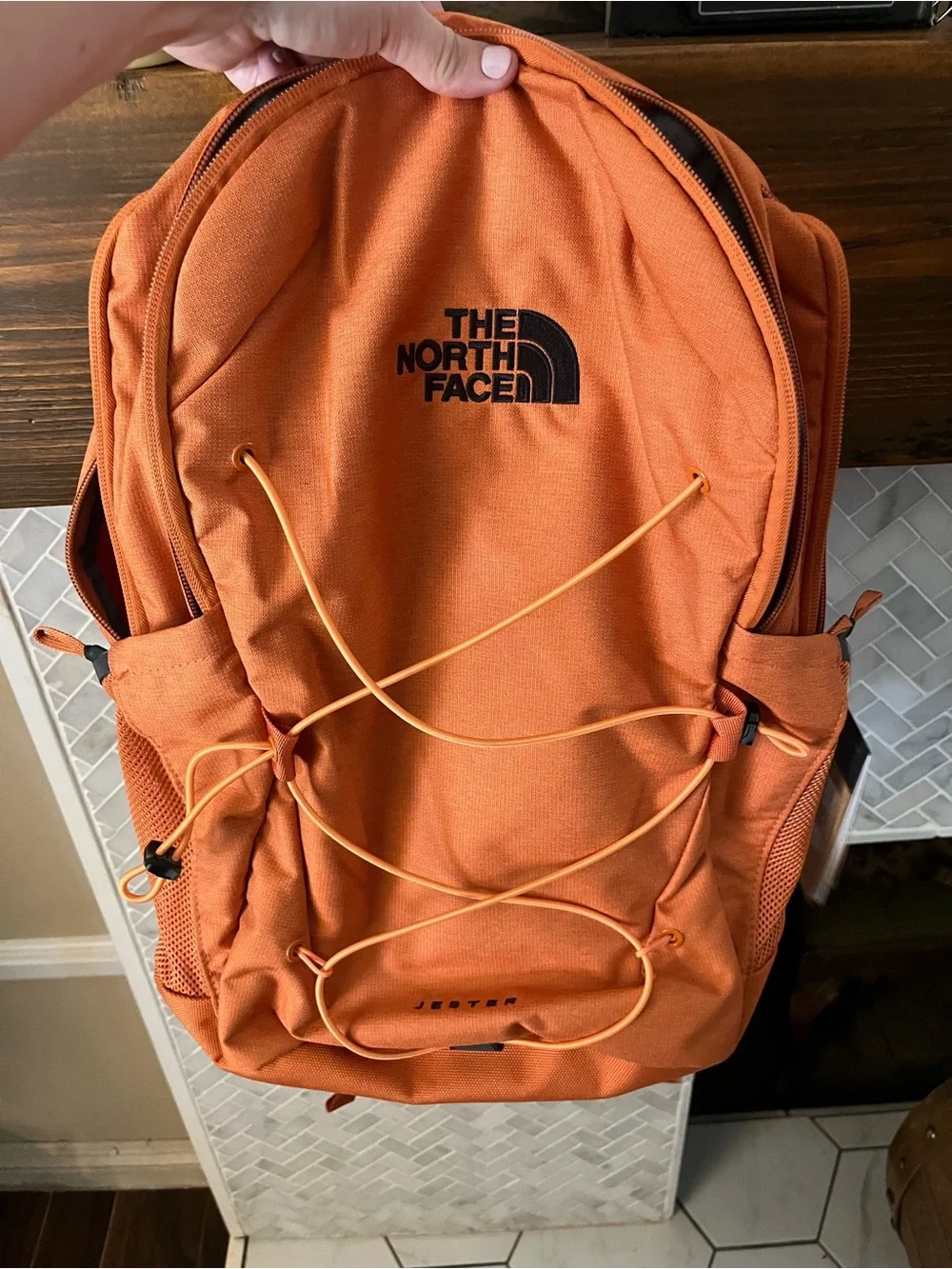 The North Face bold orange